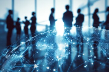 Silhouettes of business people with glowing digital globe overlay