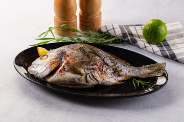 Baked dorada fish with spices