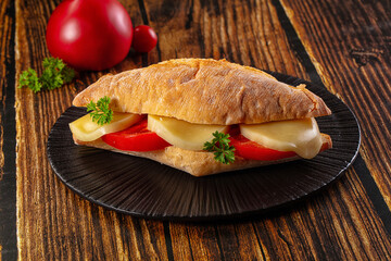 Sandwich with mozzarella and tomato