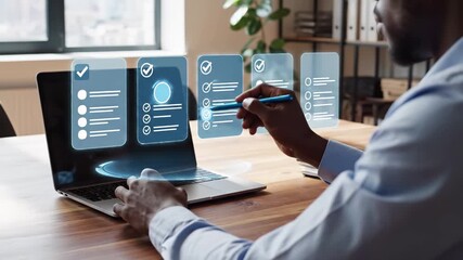 Business professional interacts with virtual holographic checklist interface over laptop at office desk. Digital task management system displays multiple checkbox lists for productivity tracking,