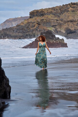 Woman walking on El Bollullo beach