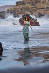 Woman walking on El Bollullo beach