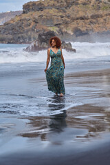 Woman walking on El Bollullo beach