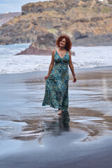 Woman walking on El Bollullo beach