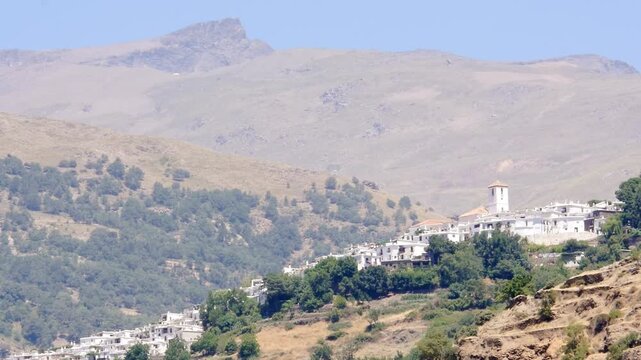 Panoramic view of the white village of Capileira, one of the highest in Spain in the Poqueira Gorge (Sierra Nevada).