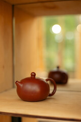Close-up photo of a traditional tea teapot used in tea ceremonies, emphasizing craftsmanship, form, texture, and the cultural heritage of mindful tea brewing rituals.