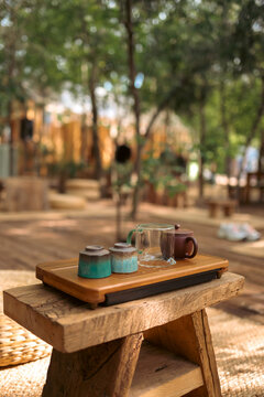 Prepared tea ceremony arrangement on a traditional chaban tea table with teapot and cups, capturing harmony, readiness, and the ritual atmosphere of traditional tea culture.