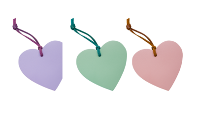 PNG image of Three pastel colored heart shaped wooden tags with leather strings for crafts on transparent background
