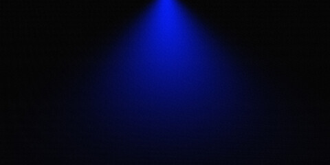 Blue spotlight beam on dark background with subtle grain texture. Elegant stage lighting effect for presentations, product display, and posters.