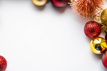 New Year background, bright red and gold balls on a white background, horizontal frame