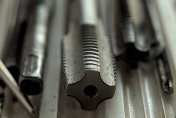 Thread tap four straight flute close up.