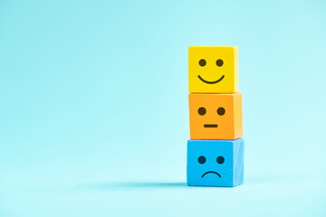 Sad to happy smiling face, influence of emotion, mental health, attitude, positive and negative mind, customer feedback rating, mood cube stack