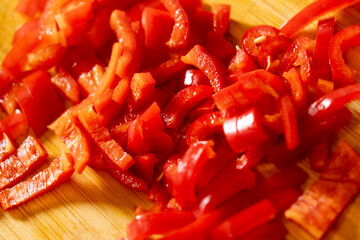 Chopped Red Bell Pepper on Wooden Cutting Board