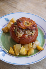 stuffed baked tomato with potatoes