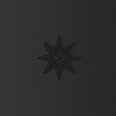 Christmas black star ornament on dark background.

