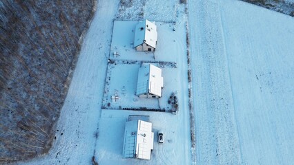 Snowy residential area with houses and rooftops