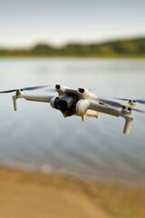 Modern quadcopter in flight for aerial survey