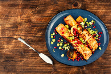 Fried salmon pieces, space for text..