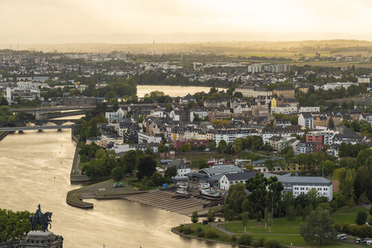 Aerial view of the Deutsches Eck where the Mosel meets the Rhine, with the statue of William I gleaming in the sunlight, Koblenz, Rhineland-Palatinate, Germany.
