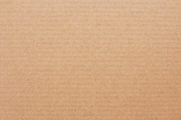 Cardboard sheet texture background, detail of recycle brown paper box pattern.
