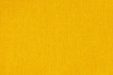 Yellow gold linen fabric cloth texture for background, natural textile pattern.