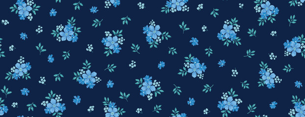 Floral liberty pattern with small colorful flowers field on a dark blue background. Repeating ditsy doodle flower meadow background. Vector design for paper, cover, fabric, interior decor and other