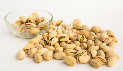 roasted pistachios on white background