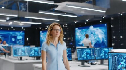 Woman in Tech Center: A focused woman navigates a high-tech center filled with interactive screens, data visualization, and the hum of innovation.