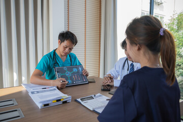 Obraz premium Diverse medical team in conference discussing diagnosis and strategy, physicians and nurses collaborating, consulting patients, sharing expertise, examining notes, presenting research, professional 