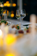 Romantic dinner scene, Elegant setting with candles and wine