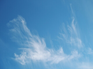 Soft atmospheric haze and thin cloud texture overhead 