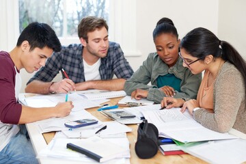 Team, students and reading book in college for education, knowledge or brainstorming together. University, group and people writing notes for information, learning and help for math exam in class