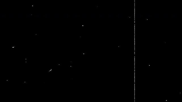 Vintage Film Countdown with Grainy Texture and Old Movie Dust Overlays on Black Background.Classic cinematic countdown featuring authentic vintage film grain, scratches, and dust particles 