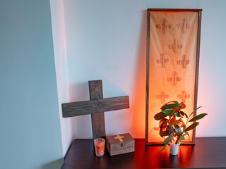 candles and cross in monastery