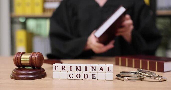 Exploring the role of criminal code in justice with judges, gavel, and law books