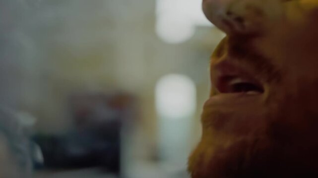 A Man Lights His Cigarette
