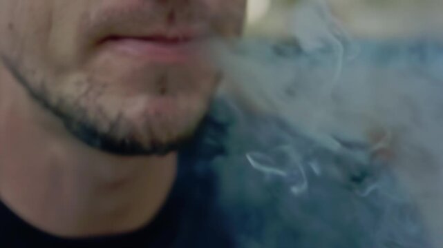 A Man Lights His Cigarette