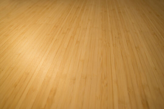 Wooden laminate flooring texture background. High resolution photo.