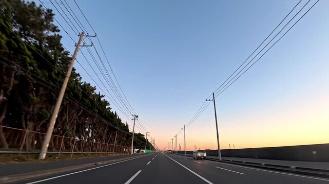 4K FOV Drive on a Quiet Bayside Road Under a Clear Sunset Sky in Japan

