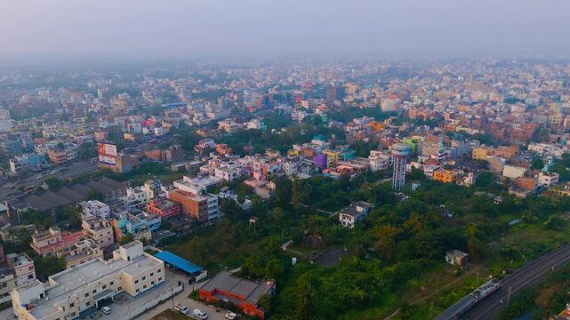 Top down Buildings and Apartment with Multiple Building aerial. Urban Buildings and Apartment at bridge road at Delhi. Cinematic cityscape drone shot. Noida Buildings.