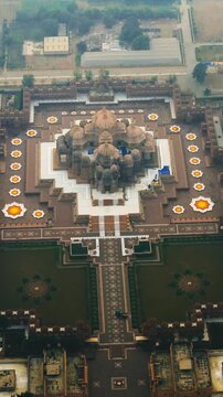 Aerial High Angle View of Swaminarayan Akshardham Temple in Delhi India with Hazy Urban Cityscape