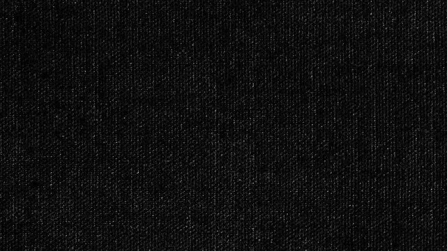 Black Denim Fabric Texture Stop Motion Loop. Dark grunge jeans cloth background animation. Abstract black woven canvas surface