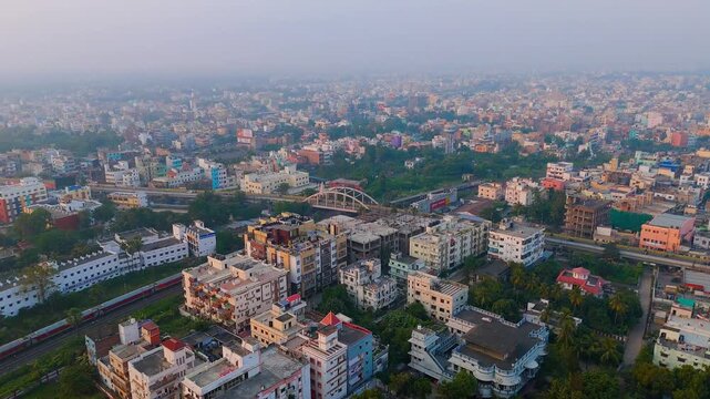 Top down Buildings and Apartment with Multiple Building aerial. Urban Buildings and Apartment at bridge road at Delhi. Cinematic cityscape drone shot. Noida Buildings.