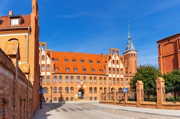 Obraz premium view of the red brick Gothic Convent of the Sisters of Charity in downtown Chelmno