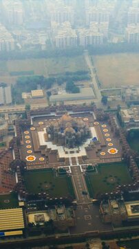 Aerial High Angle View of Swaminarayan Akshardham Temple in Delhi India with Hazy Urban Cityscape