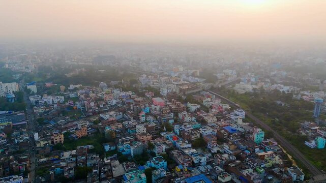 Top down Buildings and Apartment with Multiple Building aerial. Urban Buildings and Apartment at bridge road at Delhi. Cinematic cityscape drone shot. Noida Buildings.