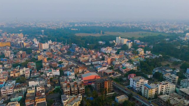 Top down Buildings and Apartment with Multiple Building aerial. Urban Buildings and Apartment at bridge road at Delhi. Cinematic cityscape drone shot. Noida Buildings.