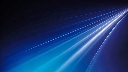 Abstract blue light streaks on dark background with motion and speed concept
