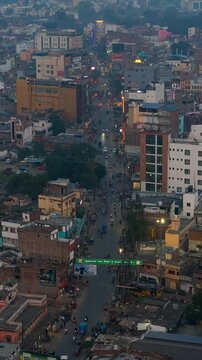 Top down Buildings and Apartment with Multiple Building aerial. Urban Buildings and Apartment at bridge road at Delhi. Cinematic cityscape drone shot. Noida Buildings.