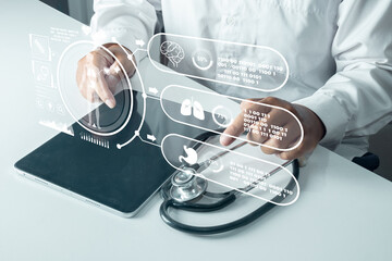 Doctor holding tablet with holographic medical interface and organ data, representing future healthcare technology, digital anatomy analysis, and artificial intelligence research.